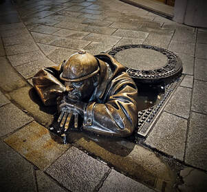 Manhole Statue